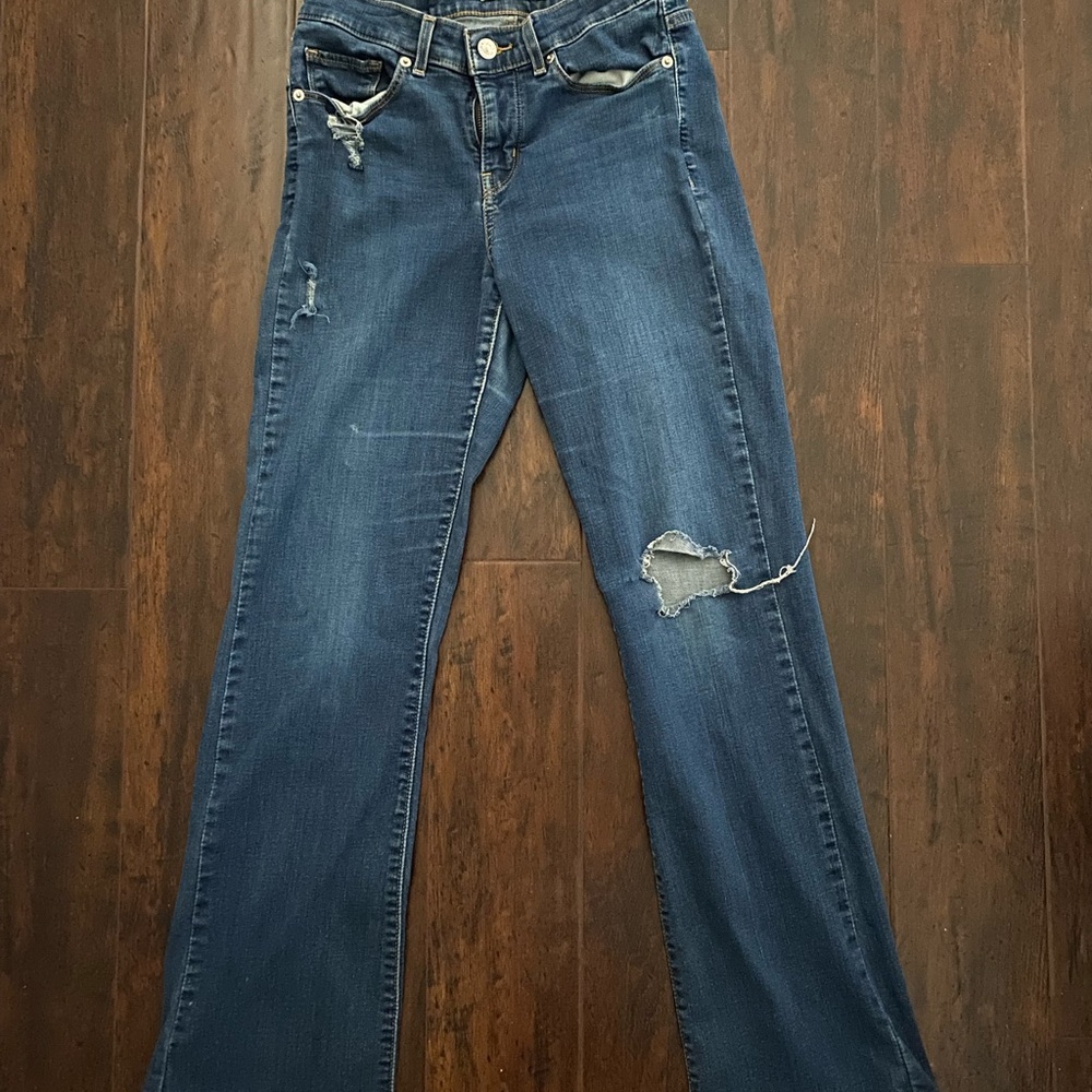Women's Distressed Blue Jeans